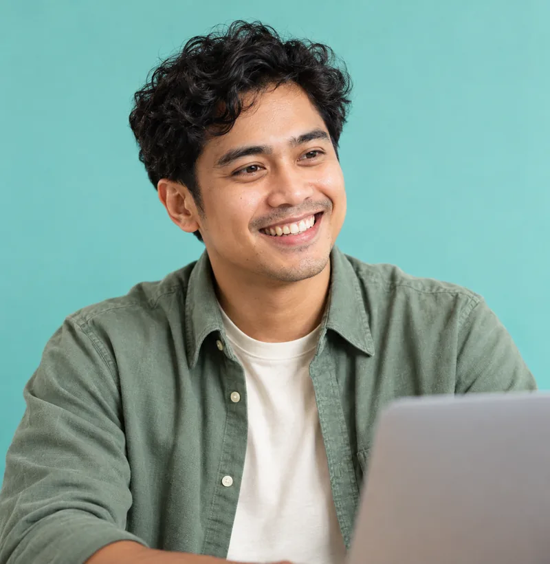 Remote specialist smiling during a video call with a client
